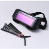 Solar-powered auto-light-changing welding glasses