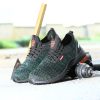 Labour insurance shoes four seasons models fly woven labour insurance shoes men up to the standard steel head anti-smash anti-puncture wear-resistant safety shoes across the border